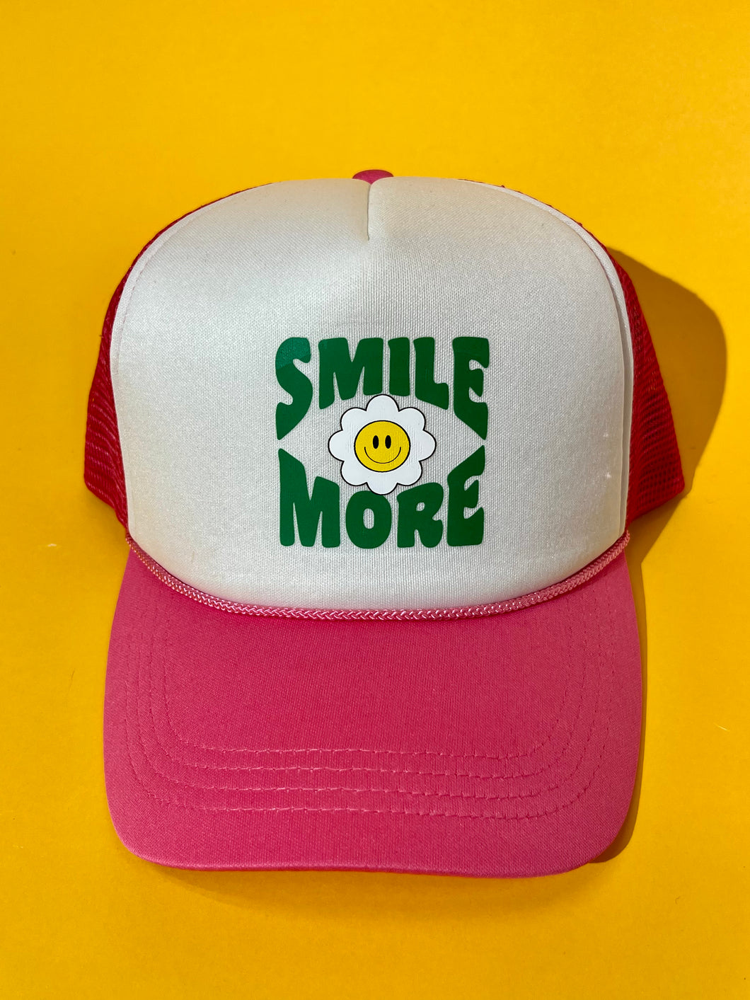 Smile more hot pink trucker hat
