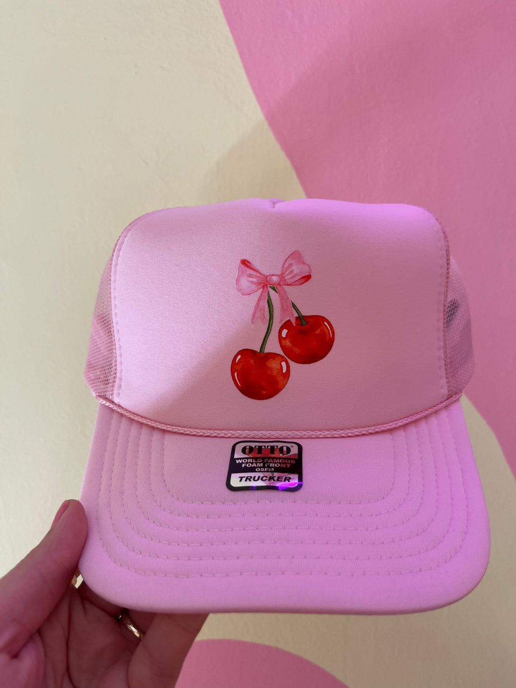 Cherry bow trucker hat