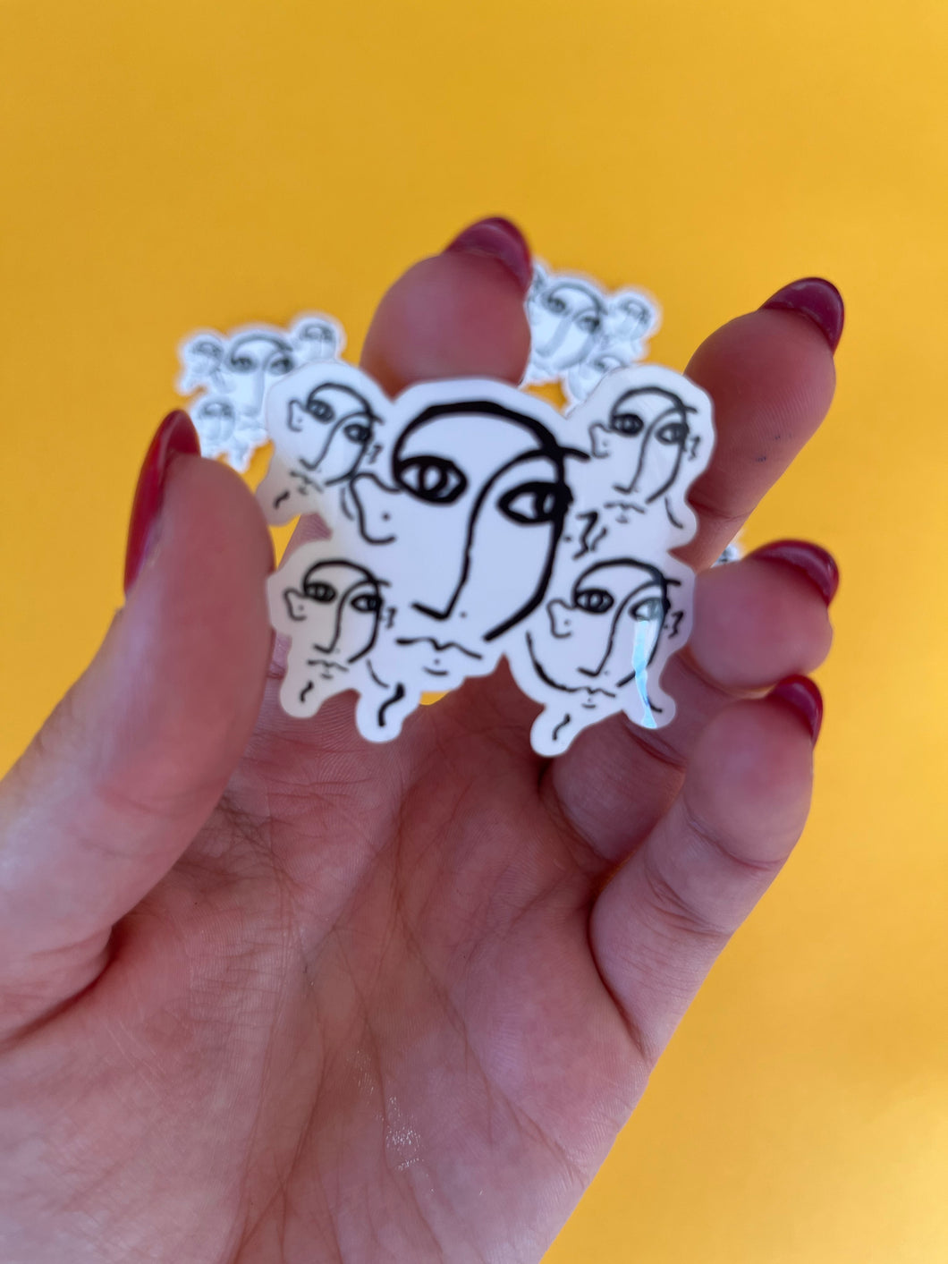 Faces on Faces Sticker